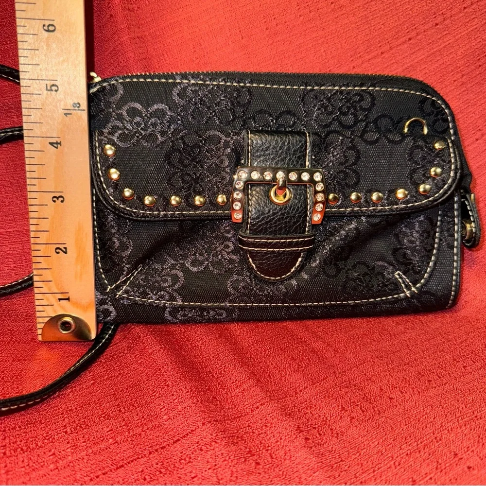 Kathy Van Zeeland Crossbody handbag with safety clasps and wristlet strap, EUC